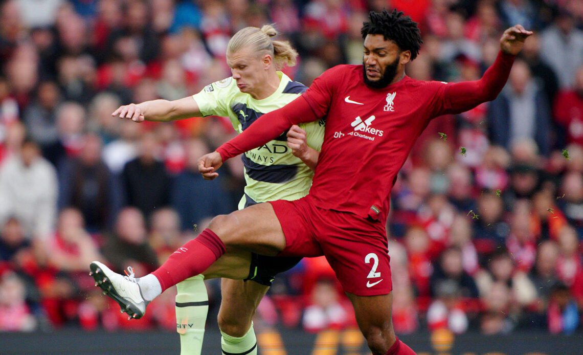 Liverpool's Joe Gomez battles with Manchester City's Erling Haaland