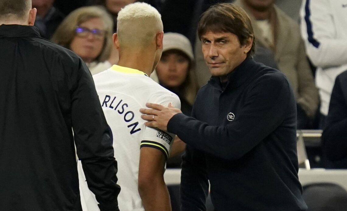 Richarlison walks past Antonio Conte after being subbed in Tottenham's win over Everton.