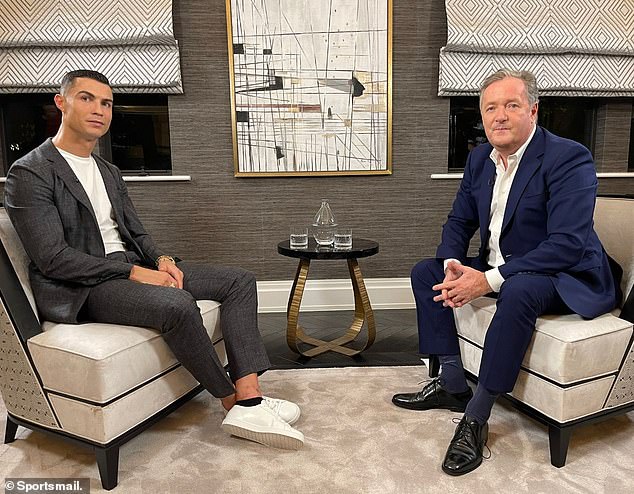 Morgan (right) carried out an explosive, controversial interview with Ronaldo on Sunday night