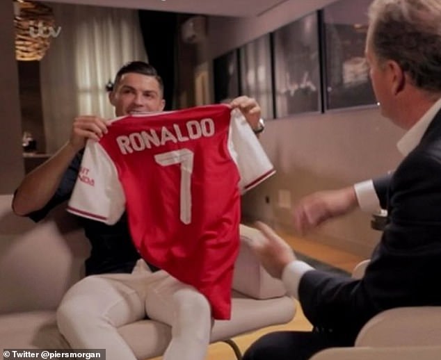 Piers Morgan tweeted a photo of Cristiano Ronaldo holding an Arsenal shirt - seemingly urging the club to sign him again