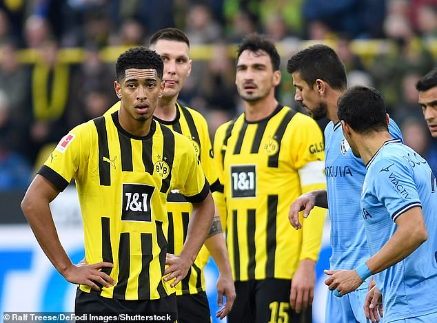 Jude Bellingham (left) is reportedly at the centre of a dressing room rift at Borussia Dortmund