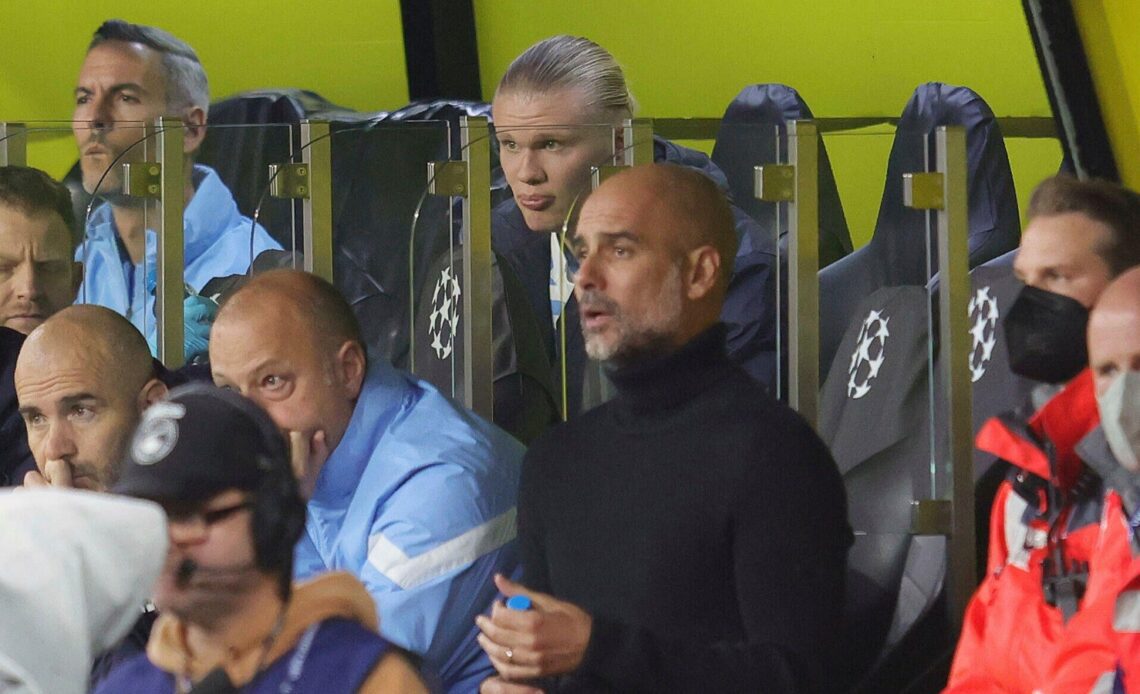 Pep Guardiola and Erling Haaland during a match