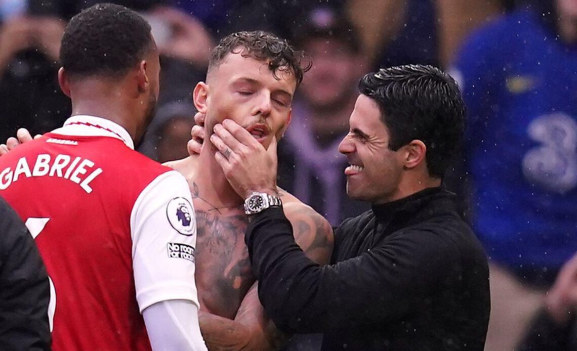 Arsenal boss Mikel Arteta squeezes Ben White's face