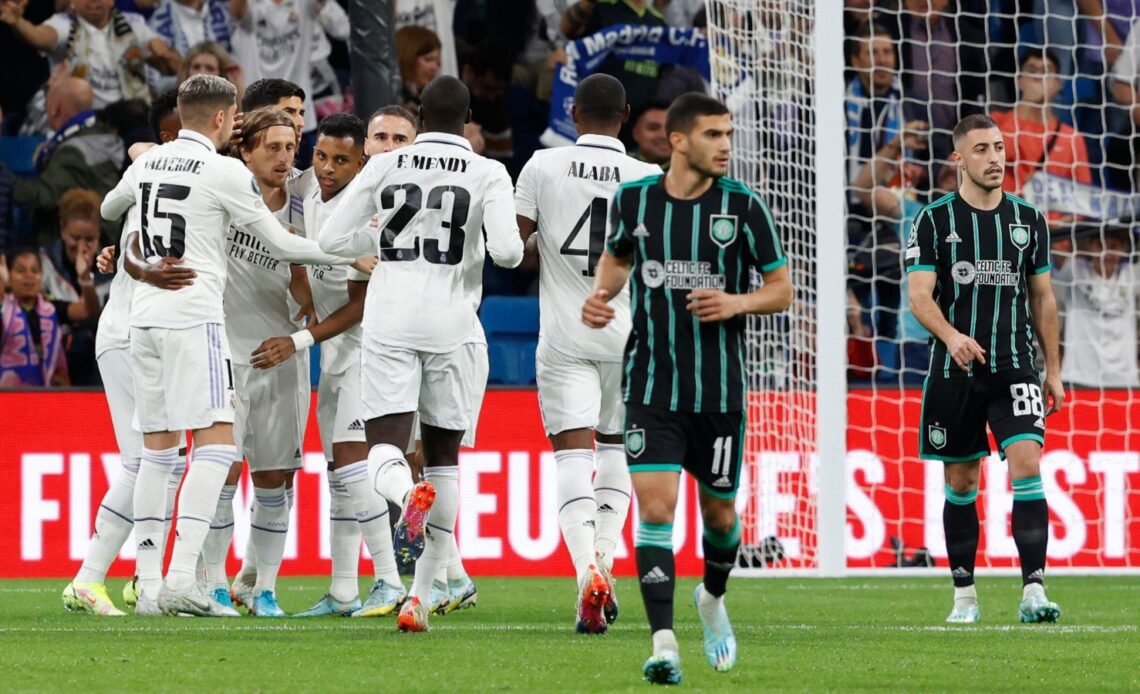 Real Madrid players celebrate their goal