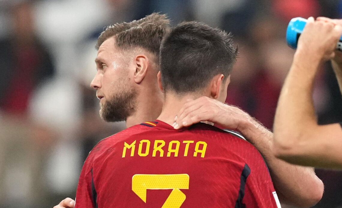 Niclas Fullkrug embraces Alvaro Morata