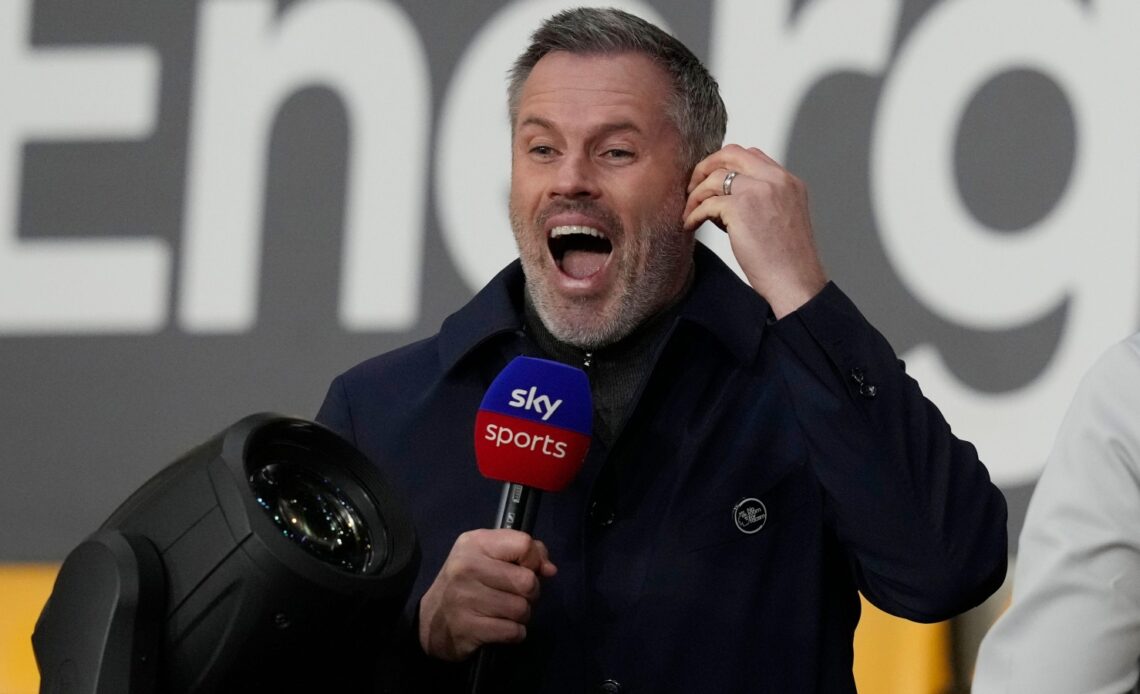Jamie Carragher laughs during a Sky Sports broadcast