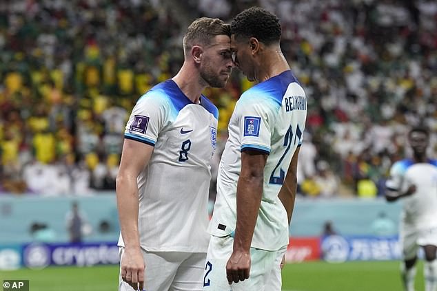Bellingham and Henderson celebrate together after combining to score against Senegal