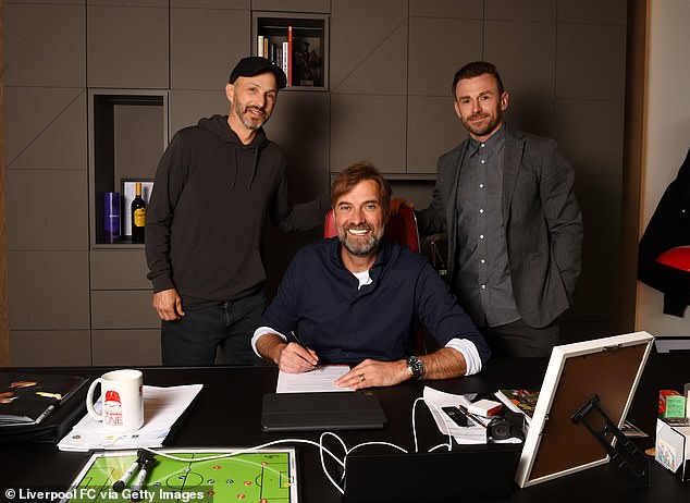 Ward (right) enjoys a close relationship with Liverpool manager Jurgen Klopp (centre)