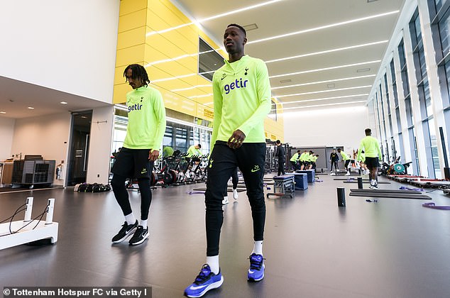 Midfielder Pape Sarr is seen training with his team-mates at Hotspur Way on Wednesday