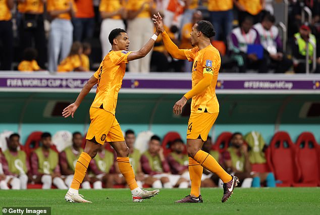 Sportsmail revealed on Tuesday that defender and Holland team-mate Virgil van Dijk (right), who plays at Anfield, reportedly made a key phone call to convince Gakpo to join Liverpool