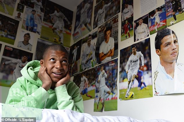 Kylian Mbappe, France's star player, broke through as a boy (above) in Parisian suburb Bondy