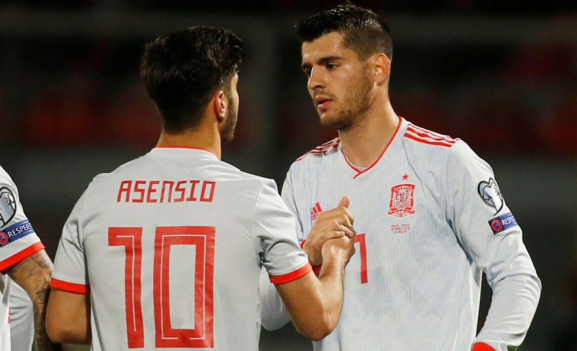 Marco Asensio and Alvaro Morata in action for Spain.