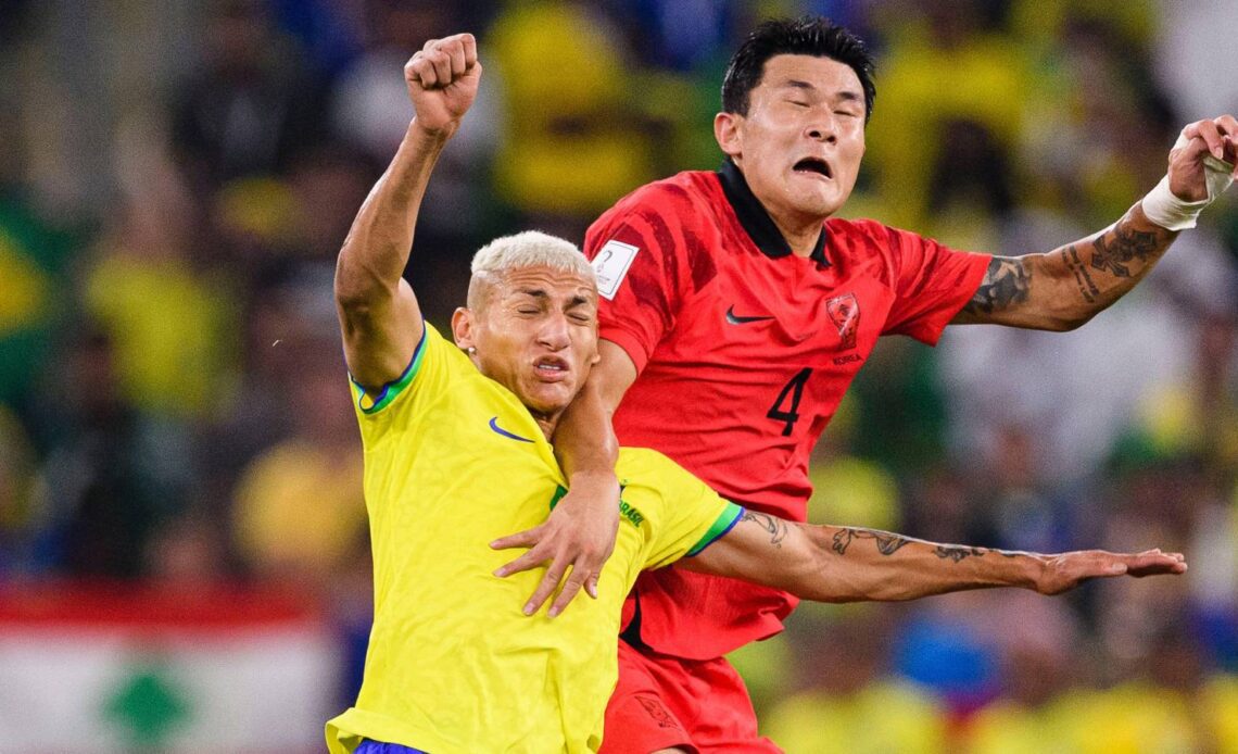 Man Utd target Kim Min-jae challenges Richarlison for the ball