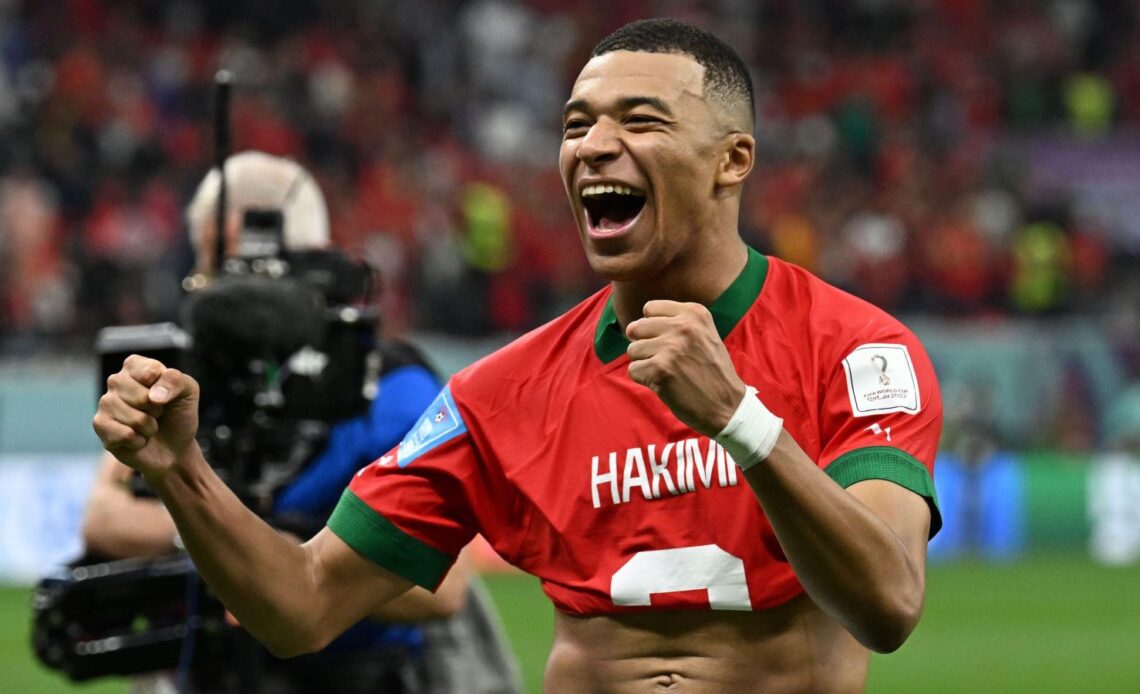Kylian Mbappe wears the shirt of Morocco defender Achraf Hakimi