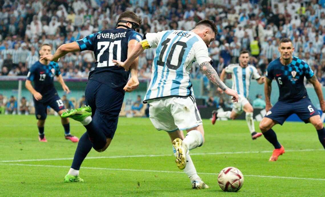 Lionel Messi takes on Josko Gvardiol during the World Cup semi-final between Argentina and Croatia