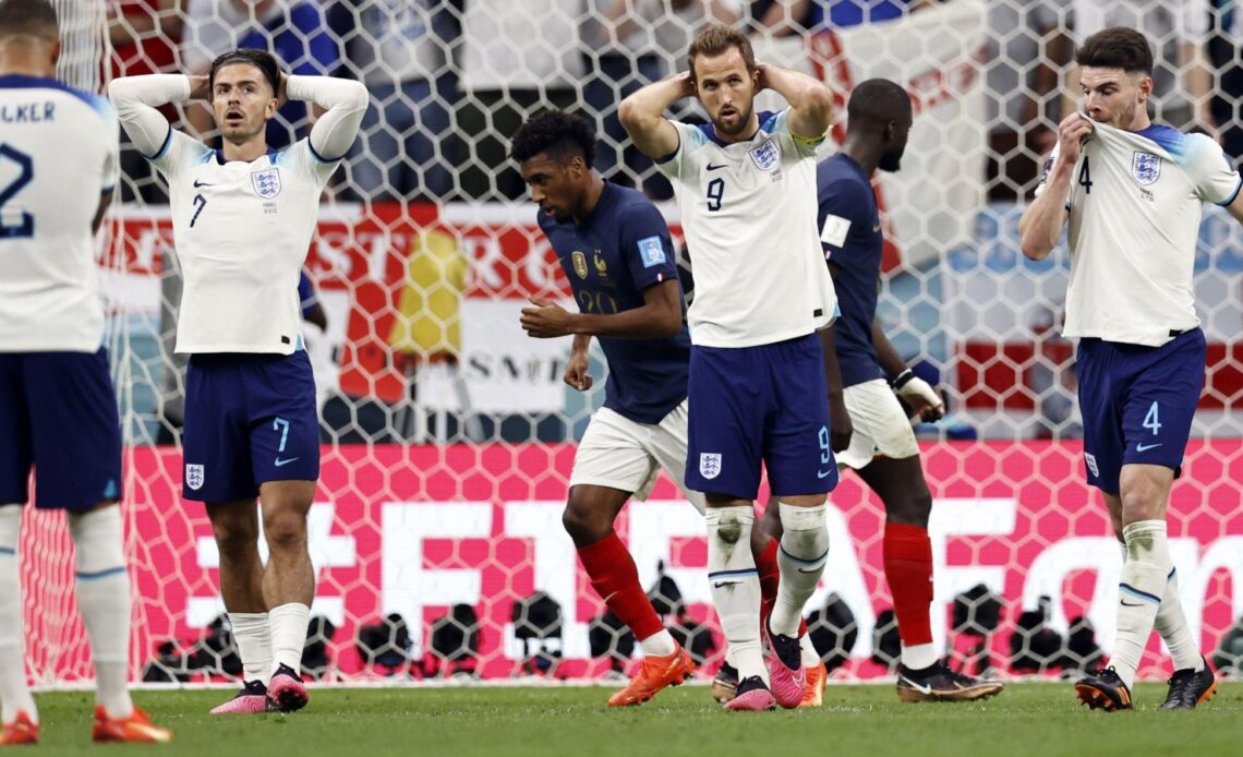 Harry Kane and other England players react during the defeat to France.