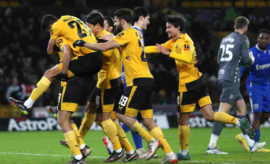 Wolves players celebrate their goal against Gillingham