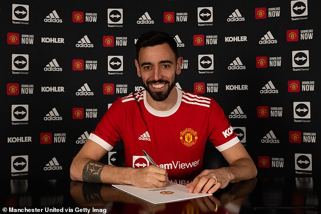 The Portuguese attacking midfielder signed a contract extension (above) with the Red Devils last year after receiving assurances regarding the club's ambitions to challenge for trophies