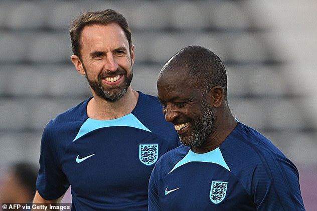 Sportsmail understands the position of highly respected coach Chris Powell (R) is uncertain
