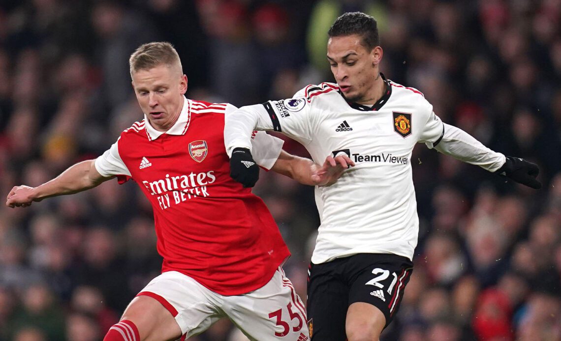 Oleksandr Zinchenko (left) and Manchester United's Antony battle for the ball during the Premier League match at the Emirates Stadium