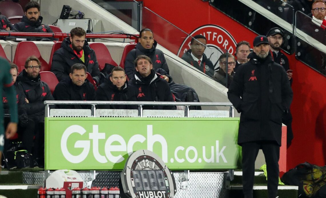 Liverpool defender Virgil van Dijk watches the game from the stands