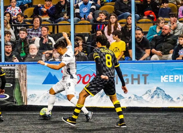 Ben-Avir Espinal of the Florida Tropics and Luan Oliveria of the Milwaukee Wave battle for a loose ball