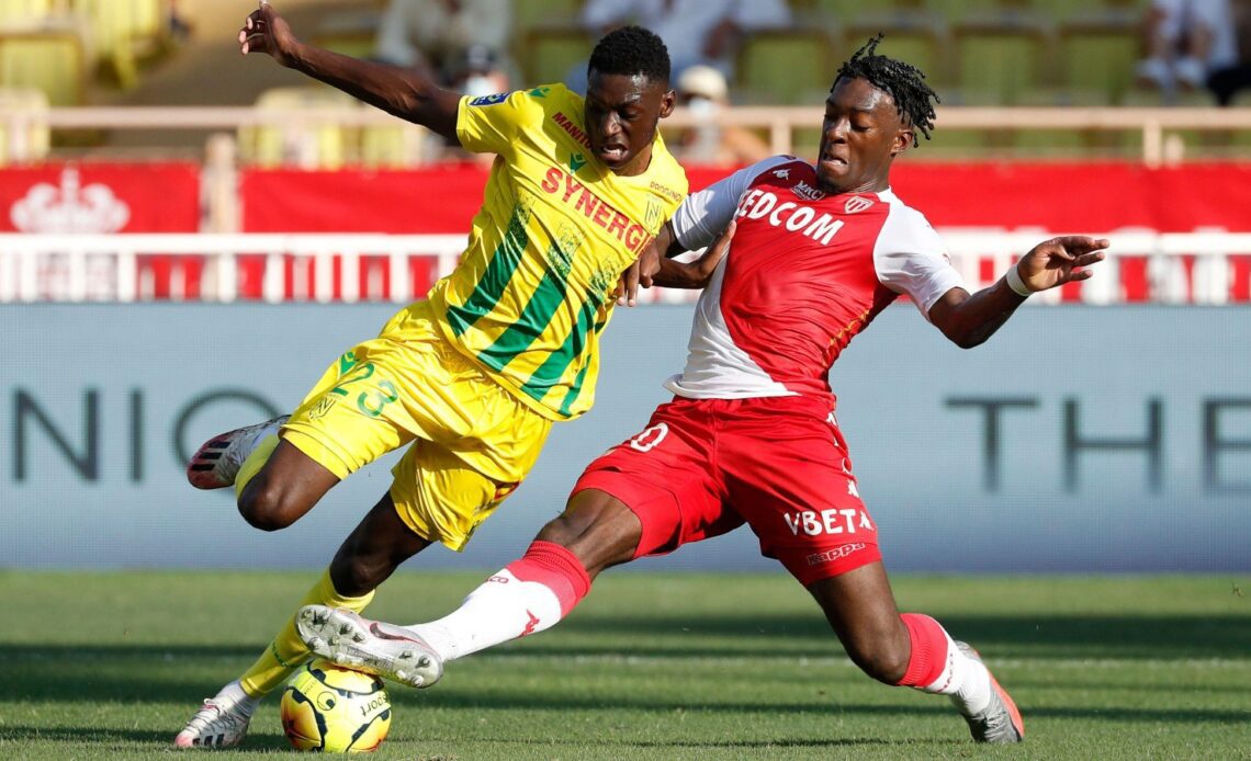 Monaco defender Axel Disasi challenges Nantes attacker Randal Kolo Muani during a game in 2020.