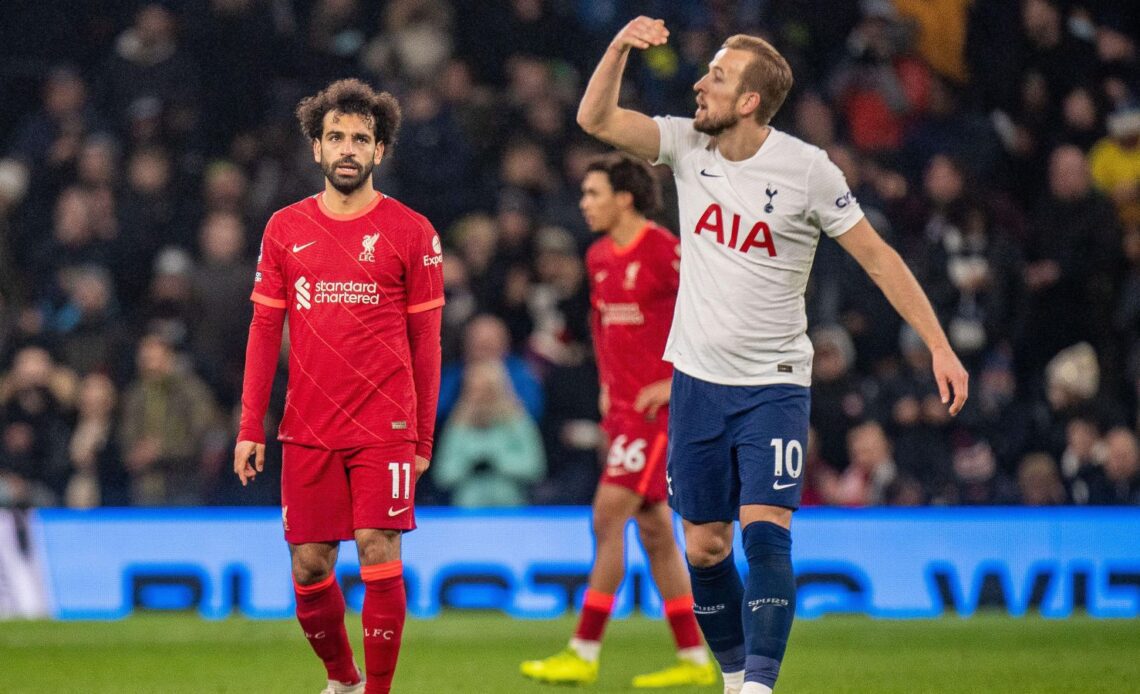 Liverpool forward Mo Salah and Harry Kane during a break in play