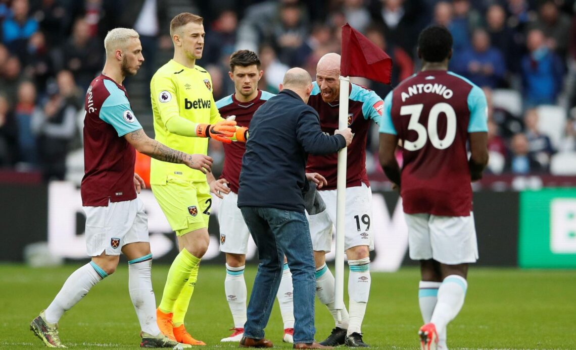West Ham fan with a flag in March 2018