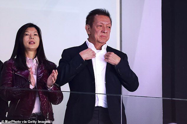 The irony is that the deeply unpopular owner Lim (right) is back at home in Singapore, not in Valencia where the proud club he owns is in crisis and is now on the brink of a relegation battle