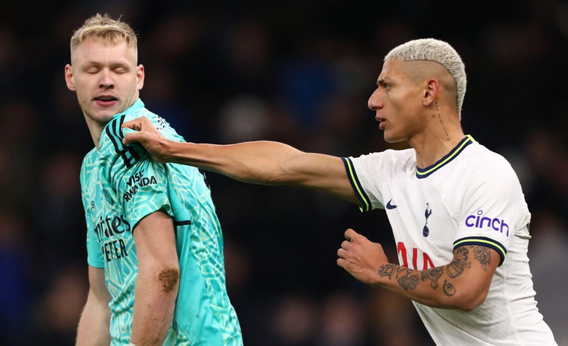 Arsenal keeper Aaron Ramsdale is confronted by Richarlison
