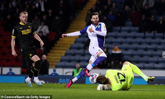 Wigan goalkeeper Ben Amos denied Blackburn striker Ben Brereton Diaz in the first-half
