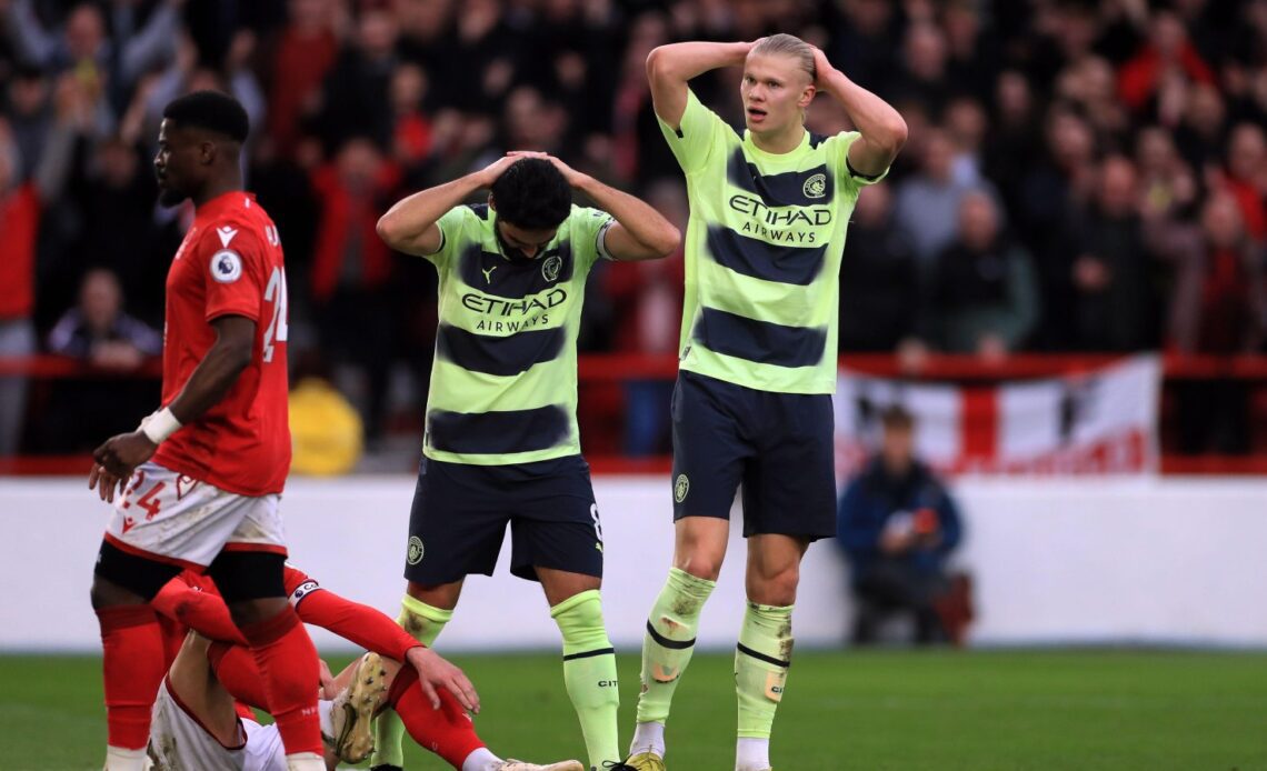 Man City striker Erling Haaland puts his hands on his head