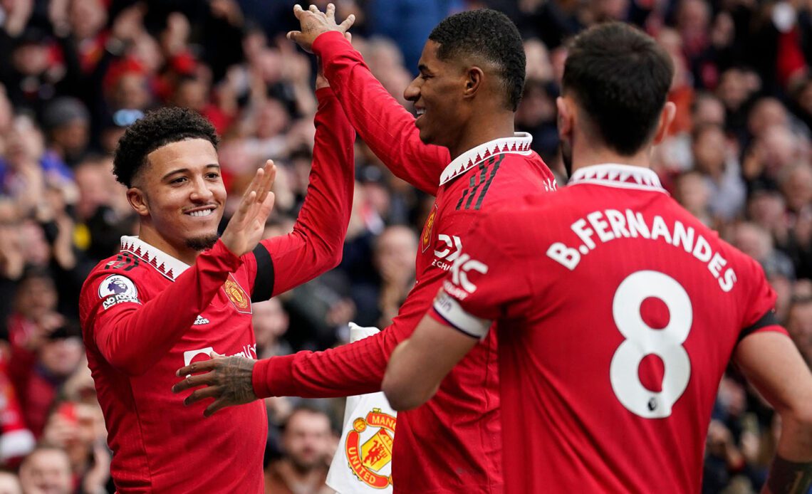 Manchester United's Jadon Sancho, left, celebrates after scoring his side's third goal during the English Premier League soccer match between Manchester United and Leicester City at the Stamford Bridge stadium in Manchester, England
