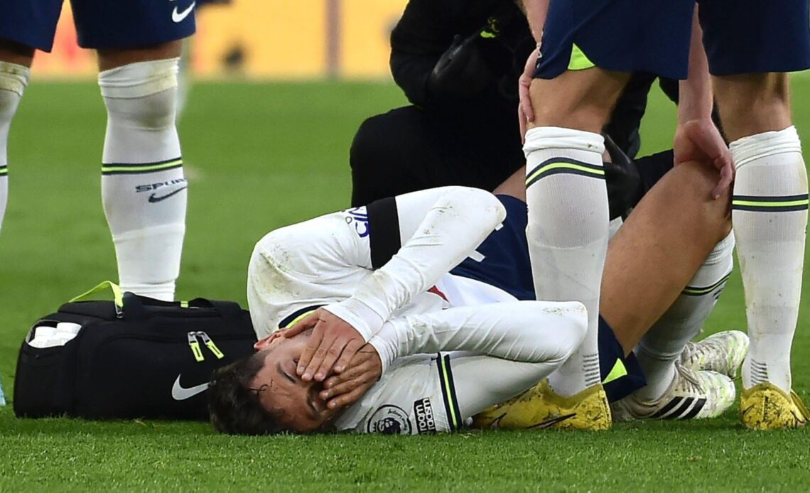 Tottenham midfielder Rodrigo Bentancur covers his face in agony