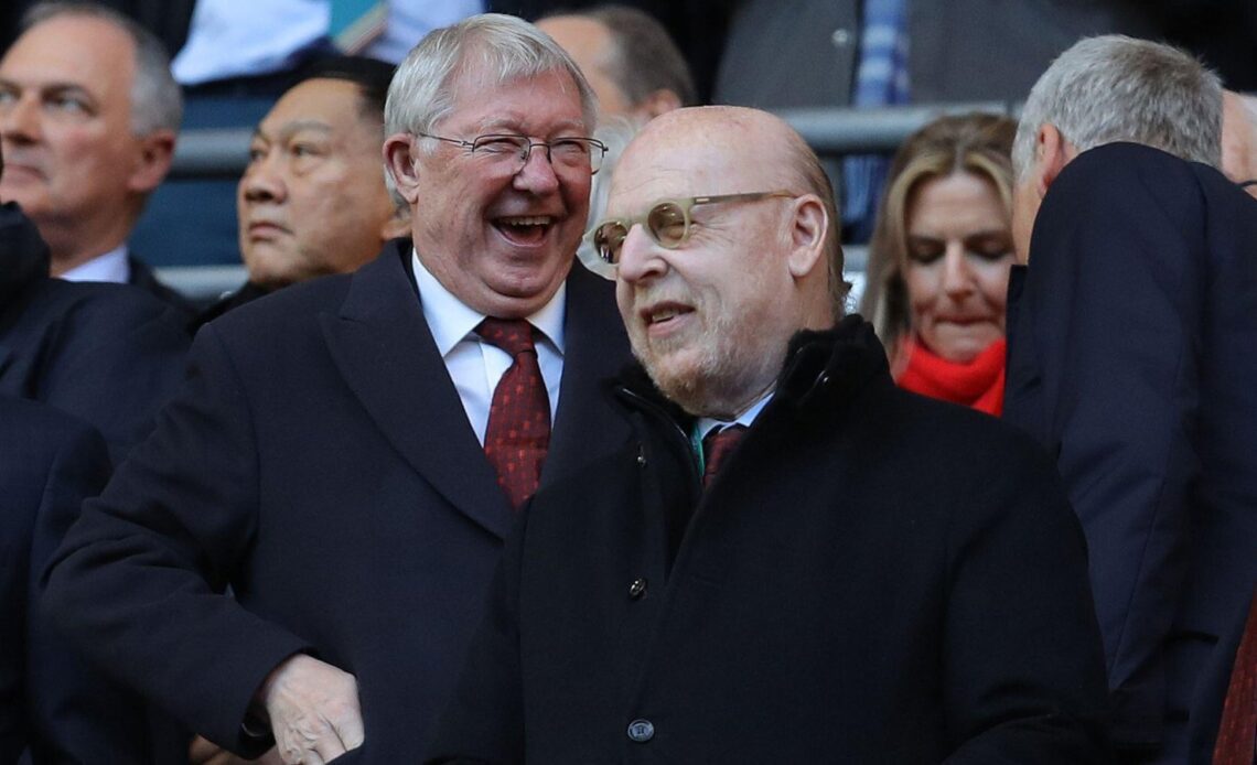 Sir Alex Ferguson laughs in the stands at Wembley