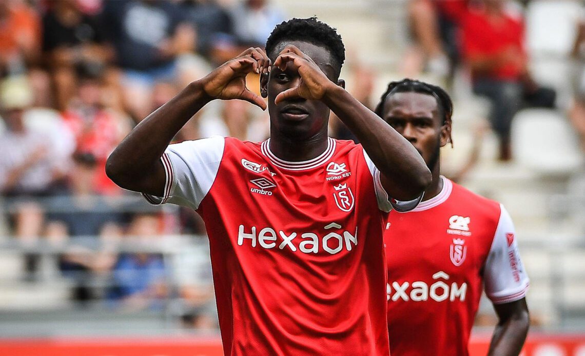 Arsenal loanee Folarin Balogun of Reims celebrates his goal during the French championship Ligue 1 football match between Stade de Reims and Clermont Foot 63 on August 14, 2022 at Auguste Delaune stadium in Reims, France