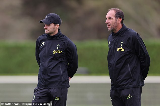 Ryan Mason (left) and Cristian Stellini (right) have been taking training during Conte's absence