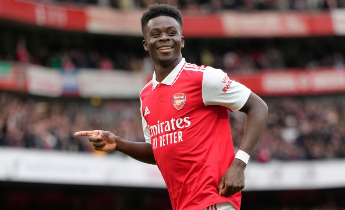 Arsenal's Bukayo Saka celebrates after scoring his side's second goal during the English Premier League soccer match between Arsenal and Crystal Palace at Emirates stadium in London, Sunday, March 19, 2023.
