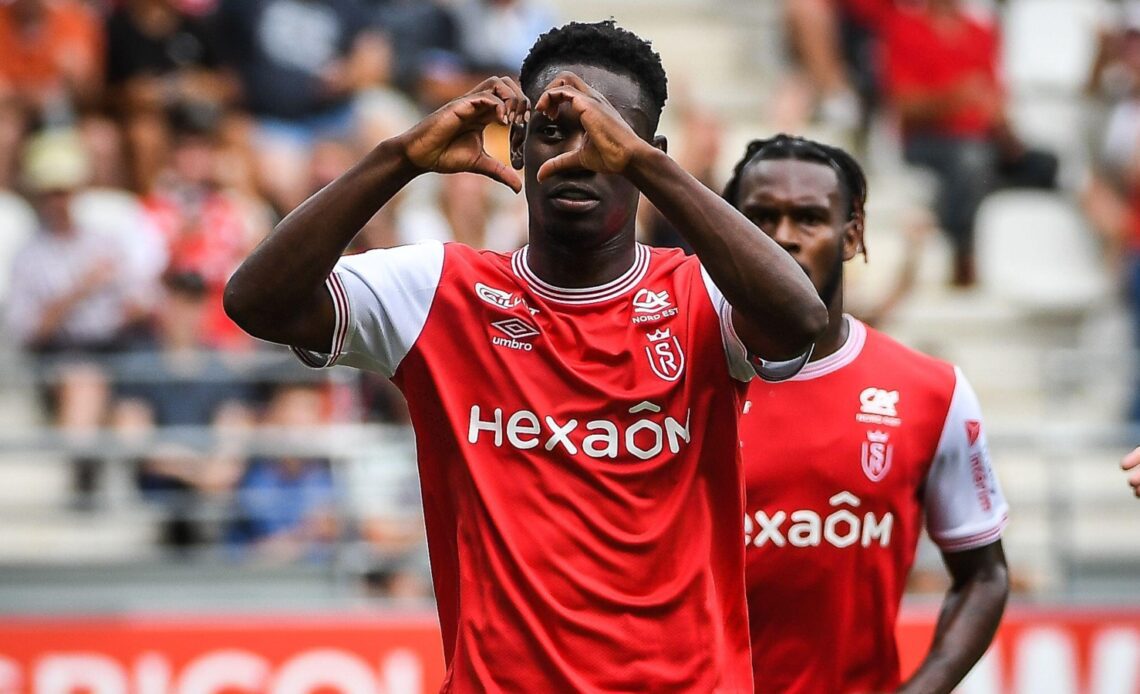Arsenal striker Folarin Balogun celebrates his goal for Stade Reims