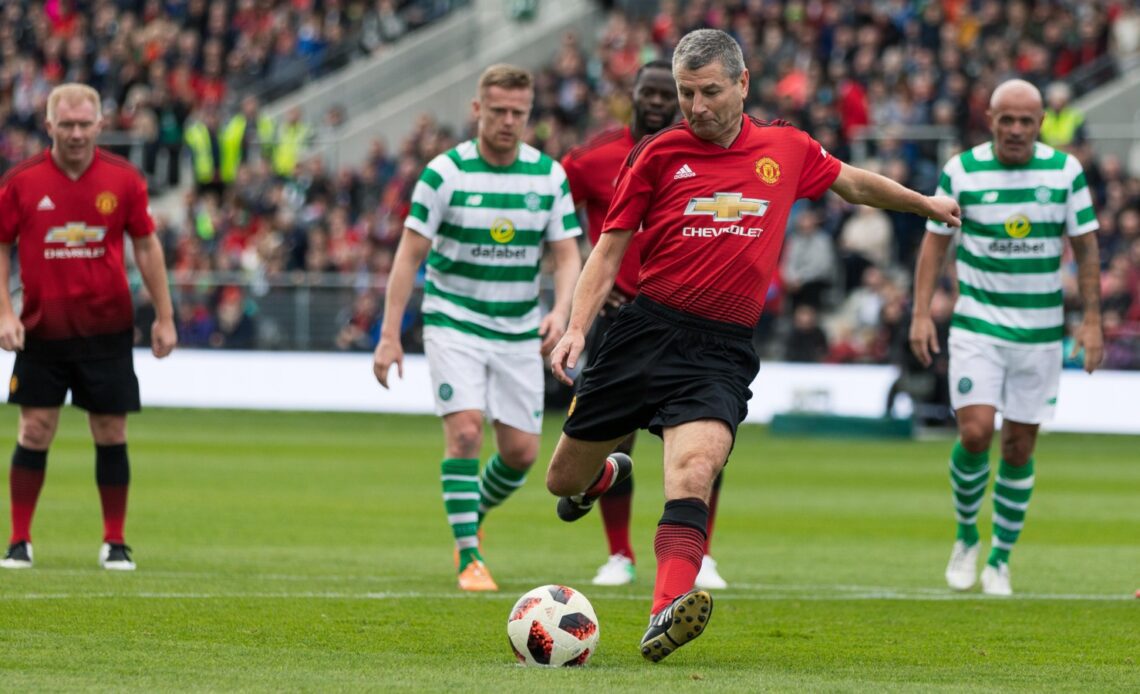 Denis Irwin takes a penalty in a Manchester United legends match against Celtic.