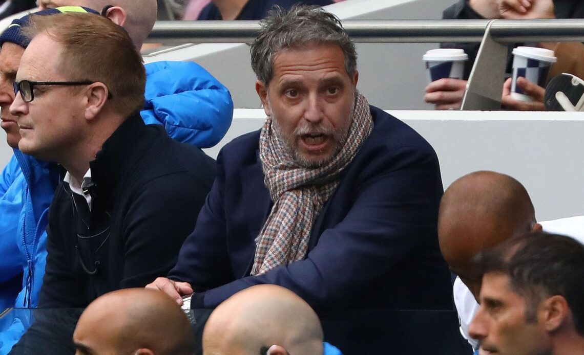 Tottenham managing director of football Fabio Paratici speaks to a coach