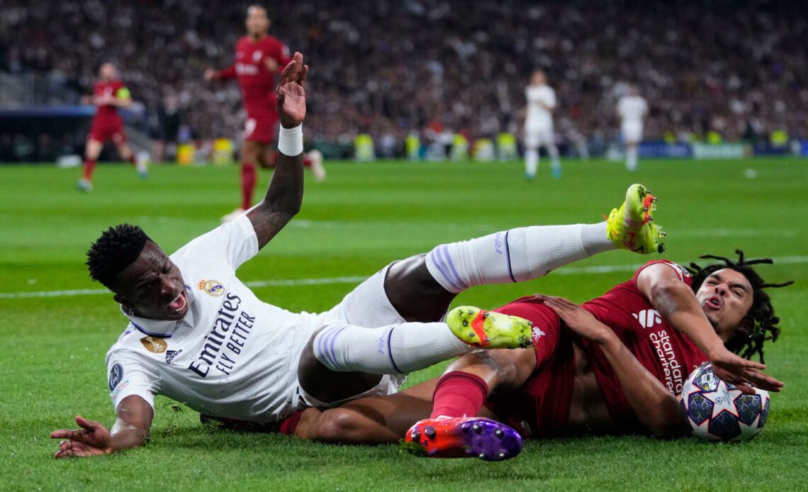 Vinicius Junior of Real Madrid and Trent Alexander-Arnold of Liverpool in a tangle