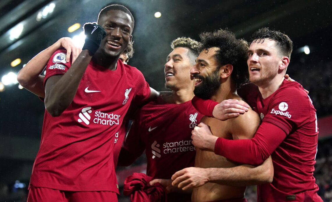 Liverpool players celebrate their goal