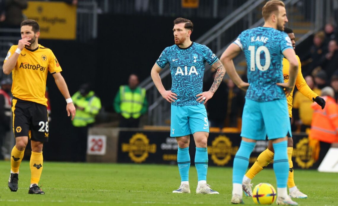 Spurs players look dejected after conceding a late winner at Wolves
