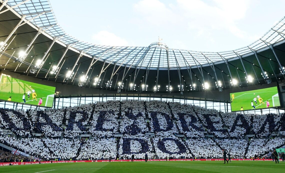 Spurs fans display a 'Dare, Dream, Do' mural at the Tottenham Hotspur Stadium.