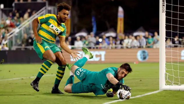 Indy Eleven goalkeeper Yannik Oettl makes a save against the Tampa Bay Rowdies