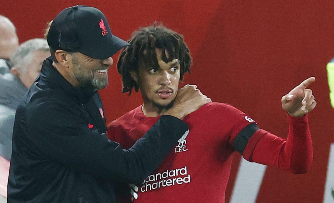Liverpool manager Jurgen Klopp talks to Trent Alexander-Arnold on the touchline at Anfield.