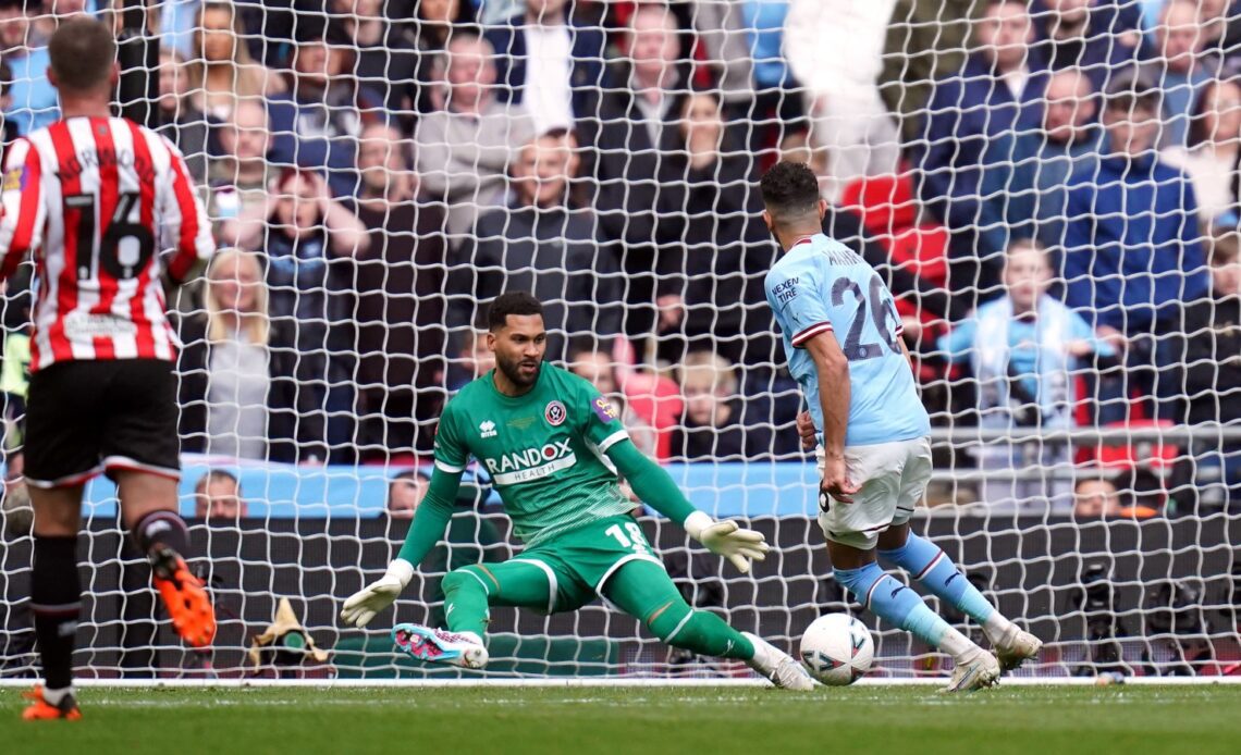 Riyad Mahrez scores his second goal for Man City in the FA Cup final against Sheffield United