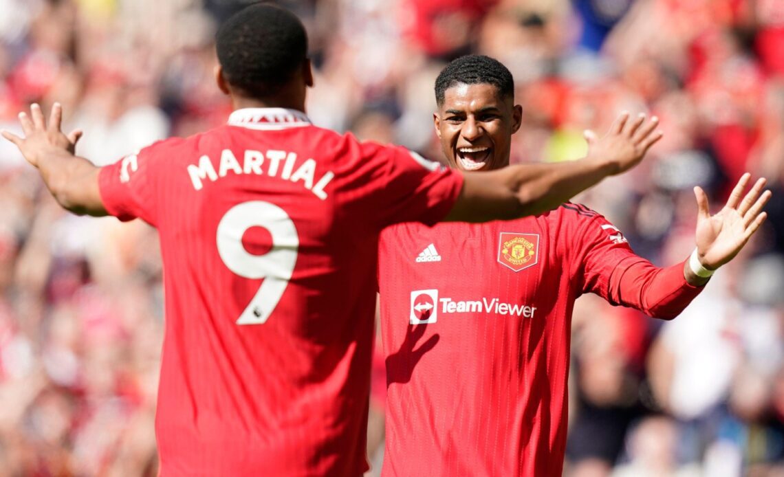 Anthony Martial and Marcus Rashford celebrate Manchester United's second goal against Everton at Old Trafford.